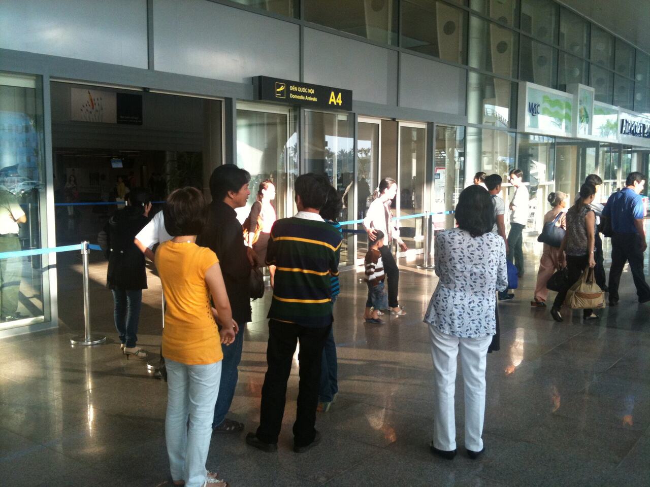 Airport arrivals hall exit passengers