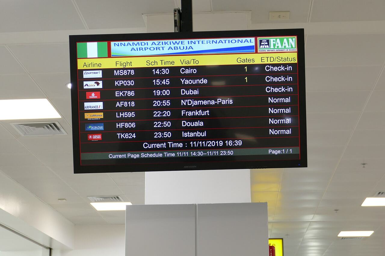 Airport flight information board delayed cancelled