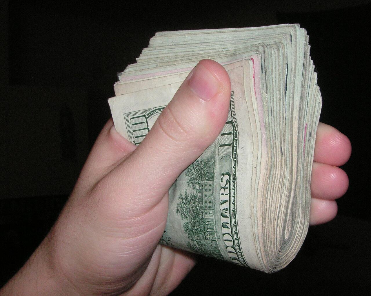 Cash banknotes wallet hands