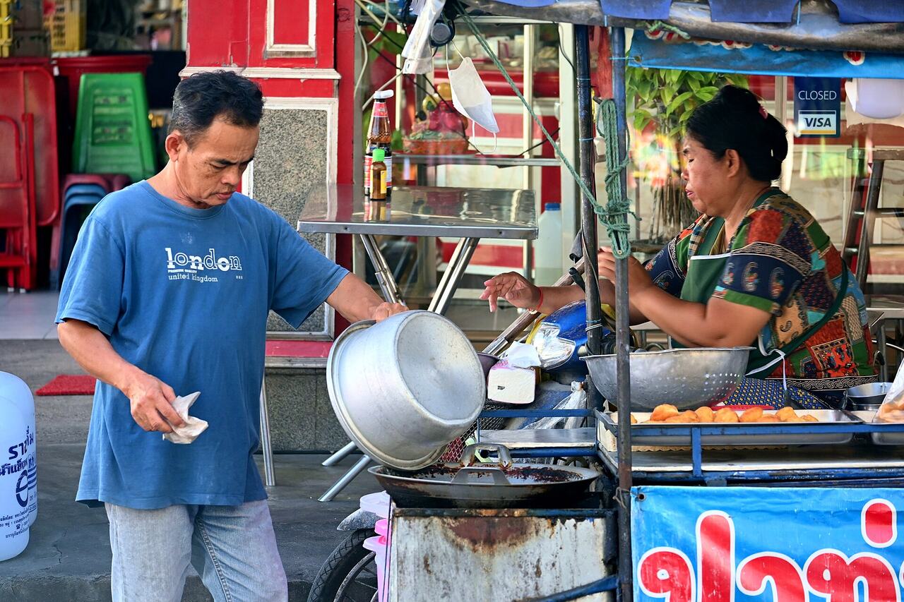 Market stall paying vendor