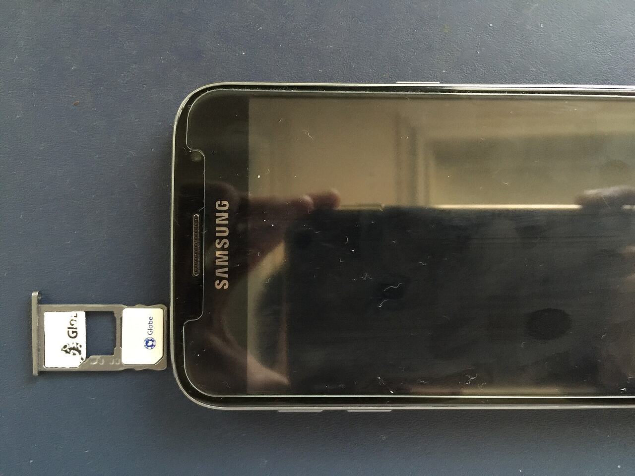 Sim card mobile phone tray