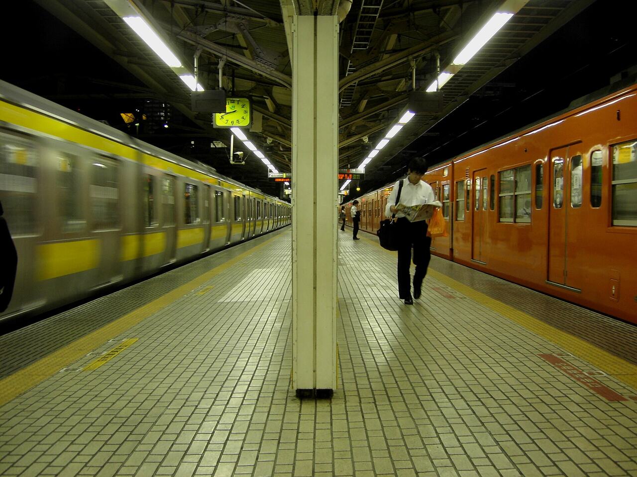 Tokyo train station platform commuters